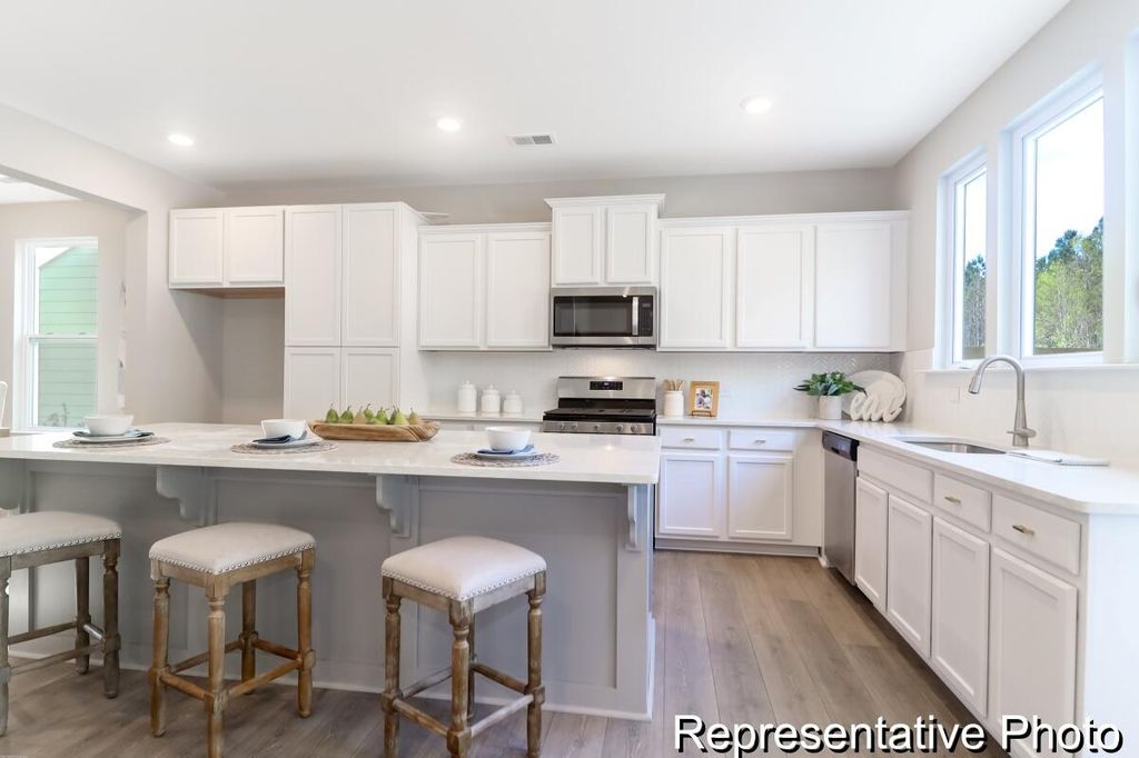 Image 13 of property listing at 1002 Hooded Warbler Way Cc3-6-1p, Ravenel, SC 29470