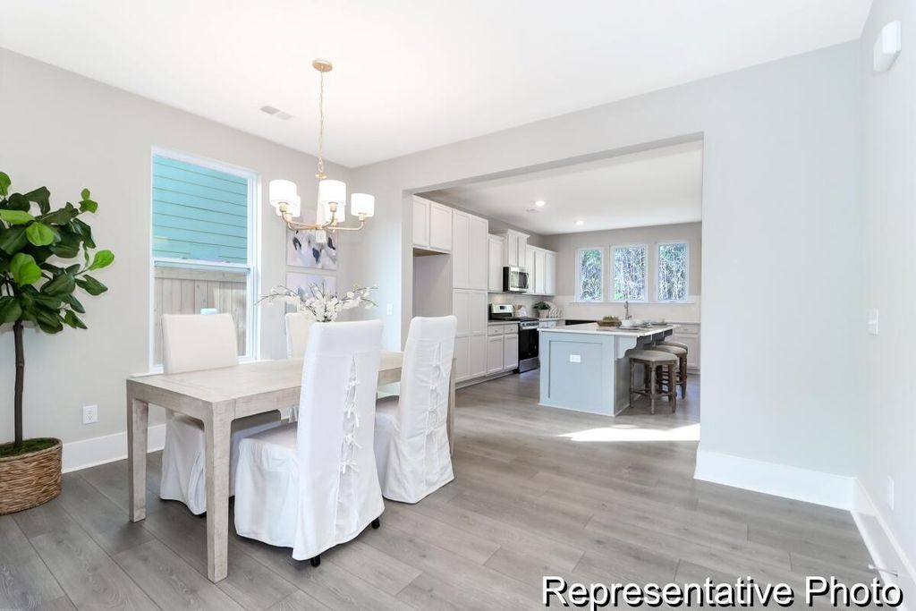 Image 2 of property listing at 1002 Hooded Warbler Way Cc3-6-1p, Ravenel, SC 29470