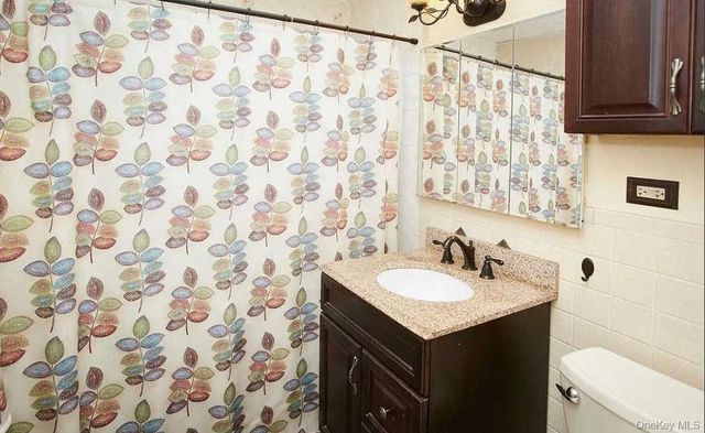 61-56 62nd Avenue, Middle Village, NY 11379