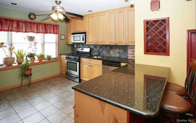 61-56 62nd Avenue, Middle Village, NY 11379