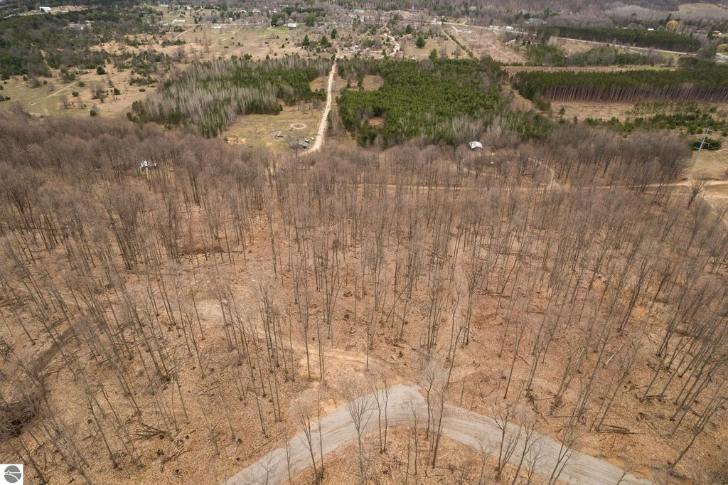 Image 30 of property listing at Lot F Retreats Way, Rapid City, MI 49676