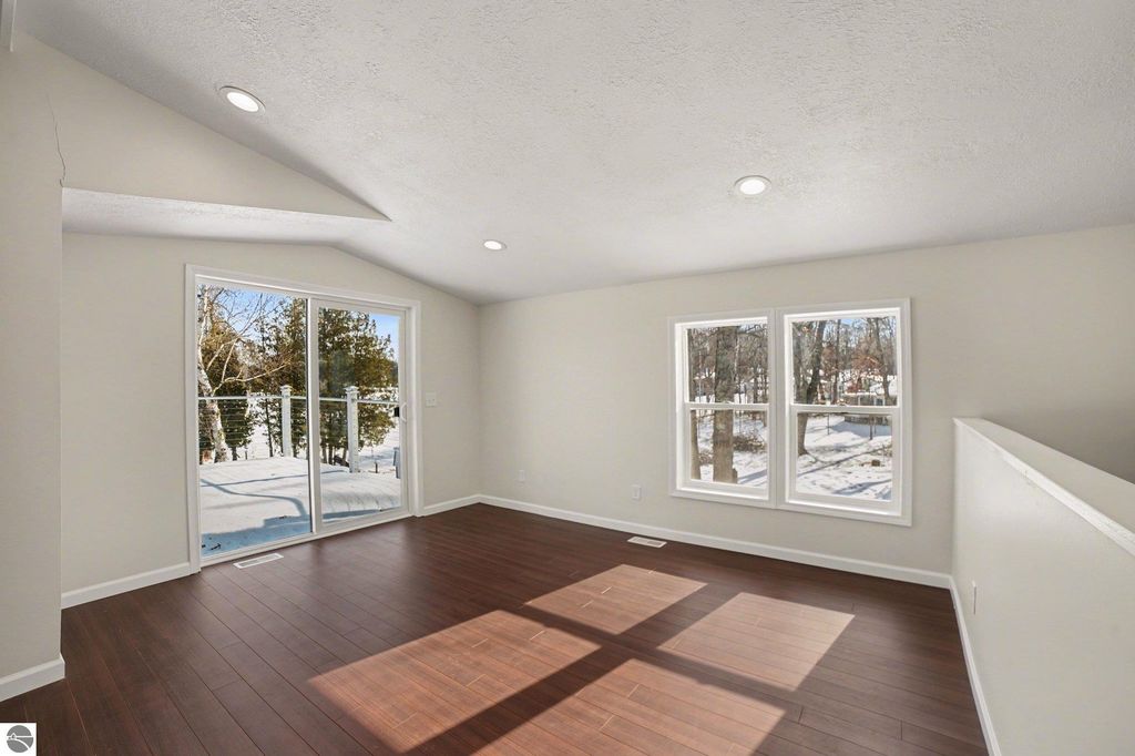 Image 9 of property listing at 6820 W Shore Drive, Weidman, MI 48893