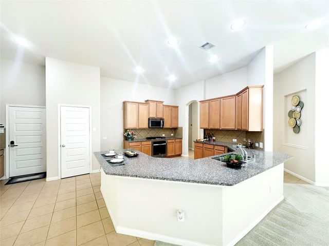 22214 Meandering Springs Drive, Spring, TX 77389