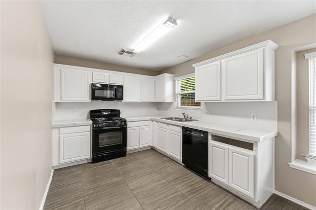 11015 Shumard Oak Court, Houston, TX 77065