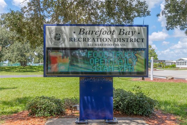 641 Hyacinth Circle, Barefoot Bay, FL 32976