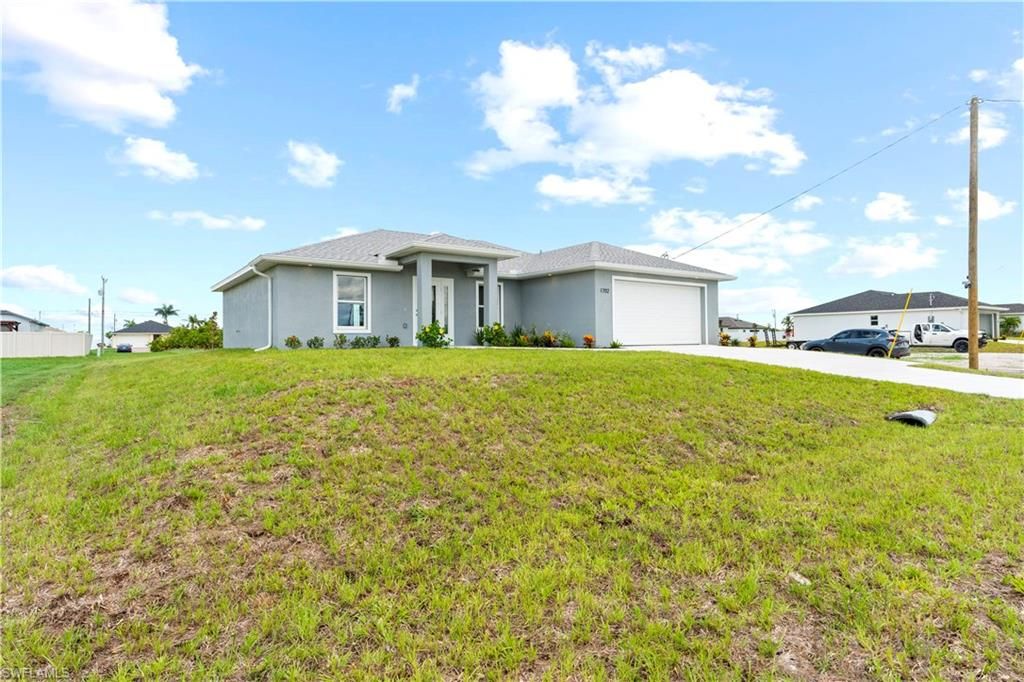 Image 1 of property listing at 1702 Nelson RD N, Cape Coral, FL 33993