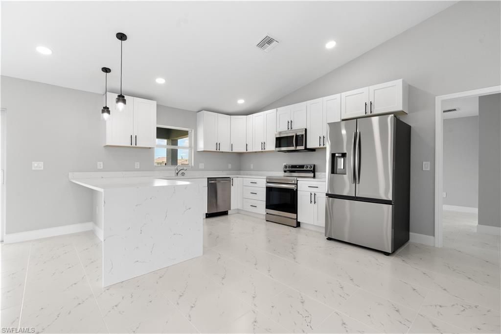 Image 7 of property listing at 1702 Nelson RD N, Cape Coral, FL 33993