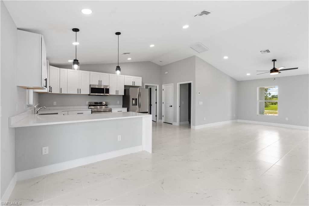 Image 9 of property listing at 1702 Nelson RD N, Cape Coral, FL 33993