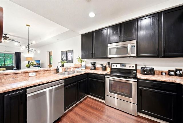 9051 TREASURE TROVE LANE 104, Kissimmee, FL 34747