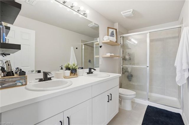 15453 Wildflower CIR, Naples, FL 34119