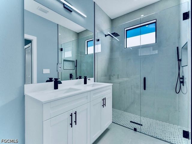 718 Bedford Point AVE, Lehigh Acres, FL 33974