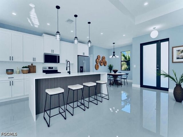 718 Bedford Point AVE, Lehigh Acres, FL 33974