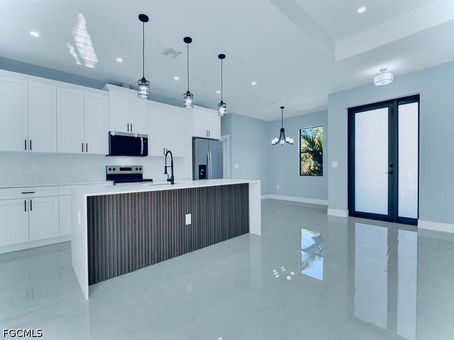 718 Bedford Point AVE, Lehigh Acres, FL 33974