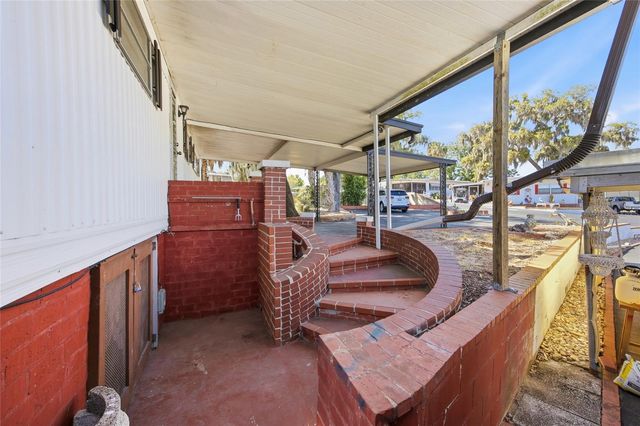 3896 PICCIOLA ROAD 411, Fruitland Park, FL 34731