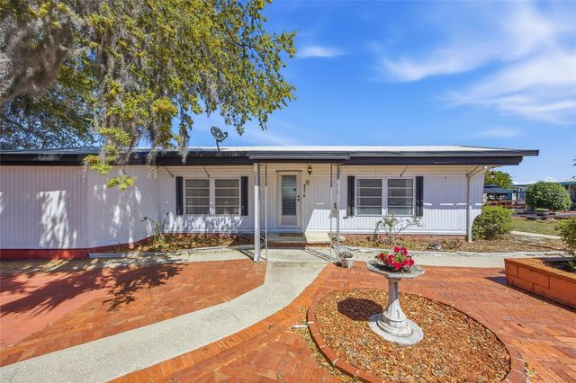 3896 PICCIOLA ROAD 411, Fruitland Park, FL 34731