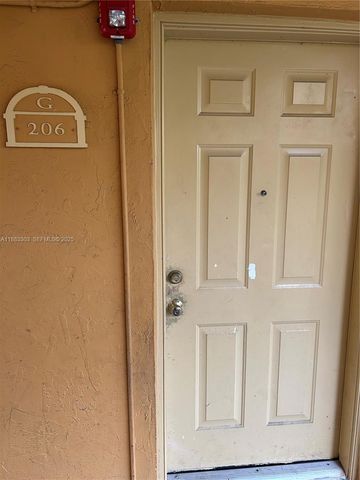 18111 NW 68th Avenue G206, Hialeah, FL 33015