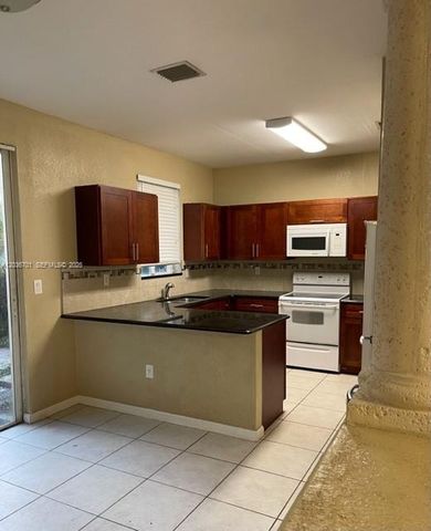 6970 NW 177th Street M104, Hialeah, FL 33015