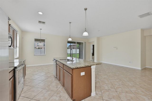 10811 KIRKWALL PORT DRIVE, Wimauma, FL 33598