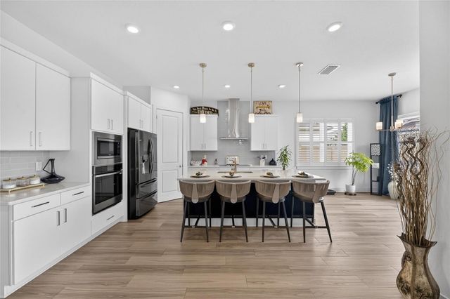 8634 DRUMMER PLANK DRIVE, Wesley Chapel, FL 33545