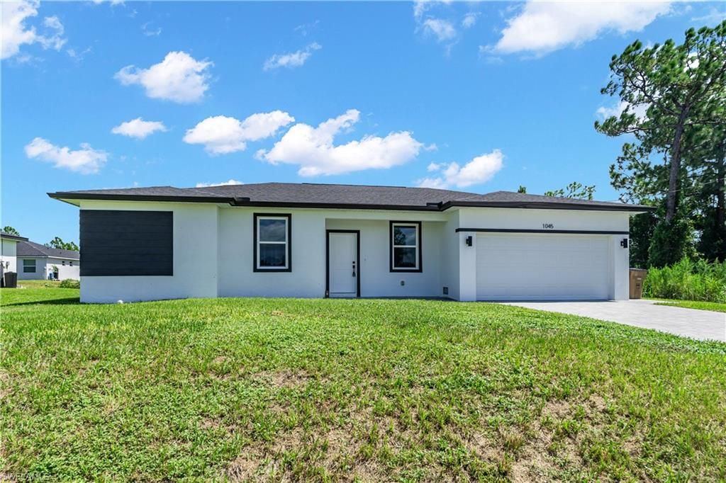 1045 Norfolk AVE S, LEHIGH ACRES, FL 33974 — photo 2