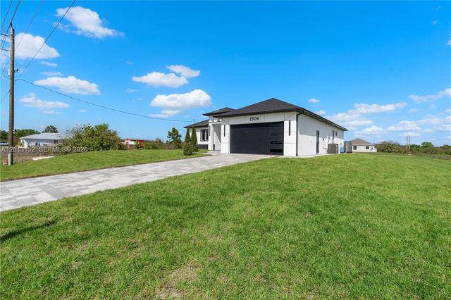 1504 Moore, Lehigh Acres, FL 33972