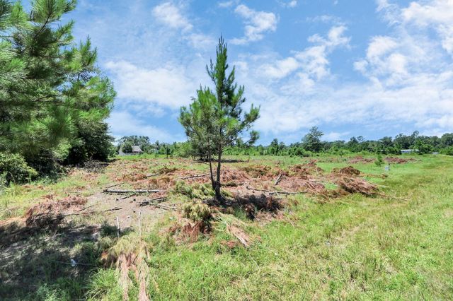 297 County Road 5025, Cleveland, TX 77327