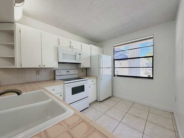 3511 Village Boulevard Unit 103, West Palm Beach, FL 33409