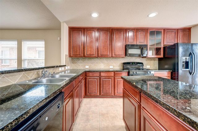 16702 Grovetrail Lane, Spring, TX 77379