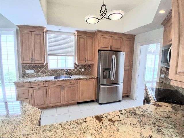 8465 BEACONHILL Road, Palm Beach Gardens, FL 33410