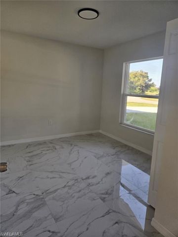 399 Carrillon AVE S, Lehigh Acres, FL 33974