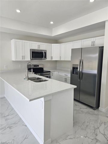 399 Carrillon AVE S, Lehigh Acres, FL 33974