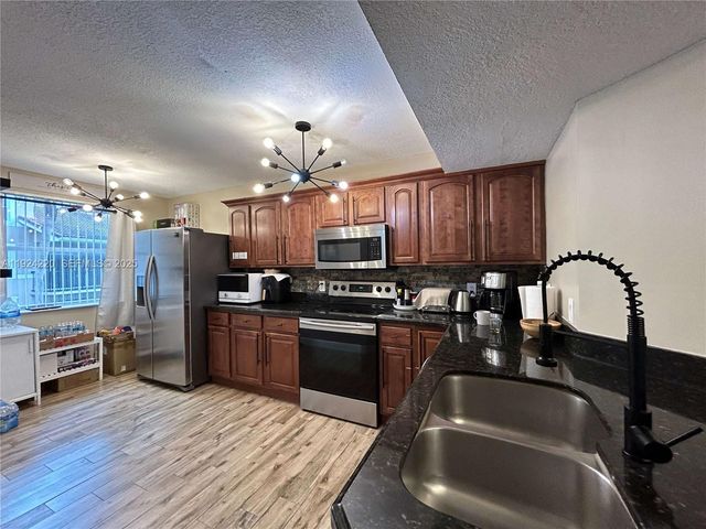 8977 Wiles Rd 208, Coral Springs, FL 33067