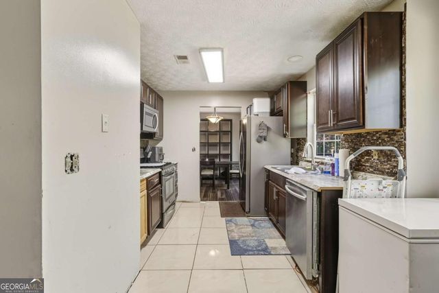 6305 Emerald Pointe Circle, Atlanta, GA 30349