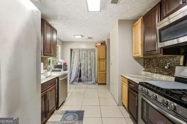 6305 Emerald Pointe Circle, Atlanta, GA 30349