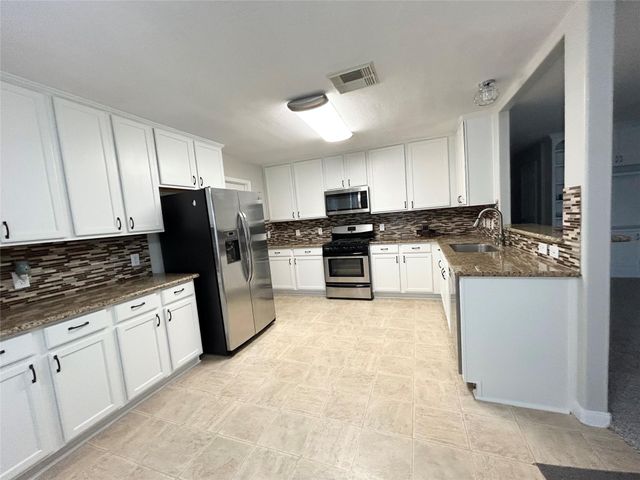 21618 Falvel Lake Drive, Spring, TX 77388