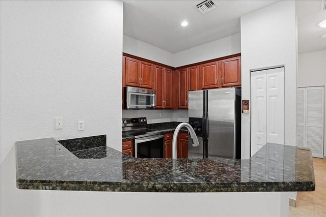 4851 Bonsai Circle 215, Palm Beach Gardens, FL 33418