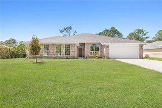18 SLIPPER ORCHID TRAIL E, Palm Coast, FL 32164