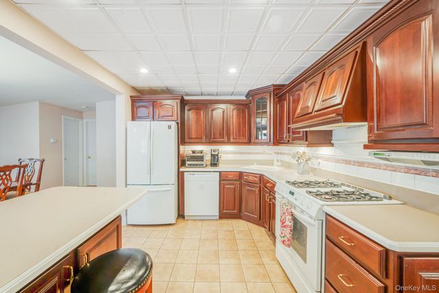77 Tyrconnell Avenue, Massapequa Park, NY 11762