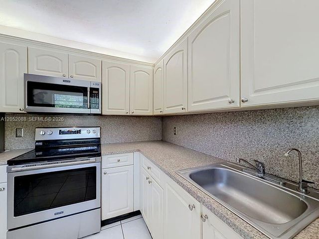 13300 SW 1st St 114O, Pembroke Pines, FL 33027