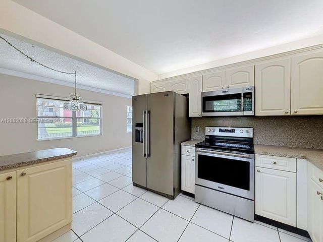 13300 SW 1st St 114O, Pembroke Pines, FL 33027