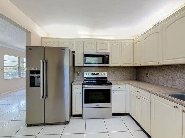 13300 SW 1st St 114O, Pembroke Pines, FL 33027