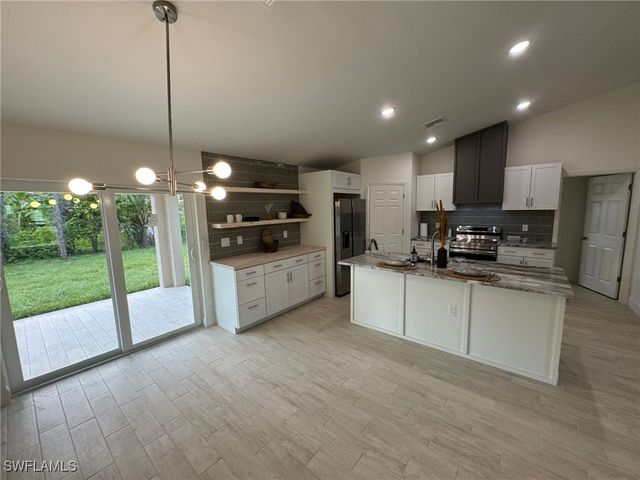 1027 Alfreda AVE, Lehigh Acres, FL 33971
