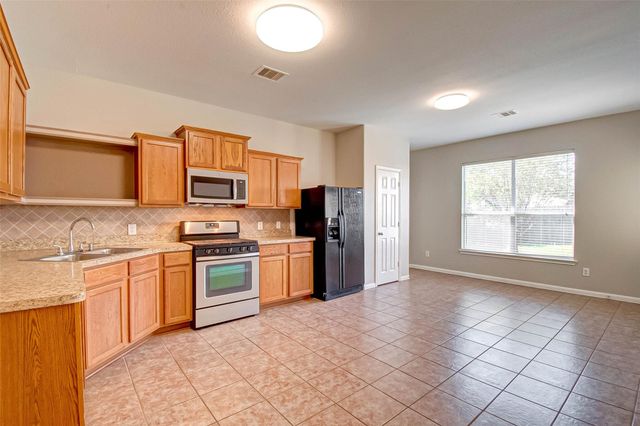 21327 Bella Flora Court, Spring, TX 77379