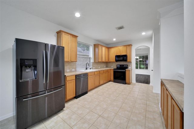 18906 Knobby Oaks Place, Magnolia, TX 77355