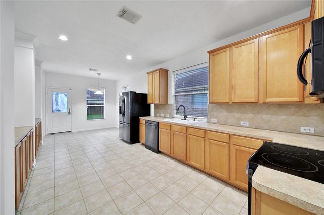 18906 Knobby Oaks Place, Magnolia, TX 77355