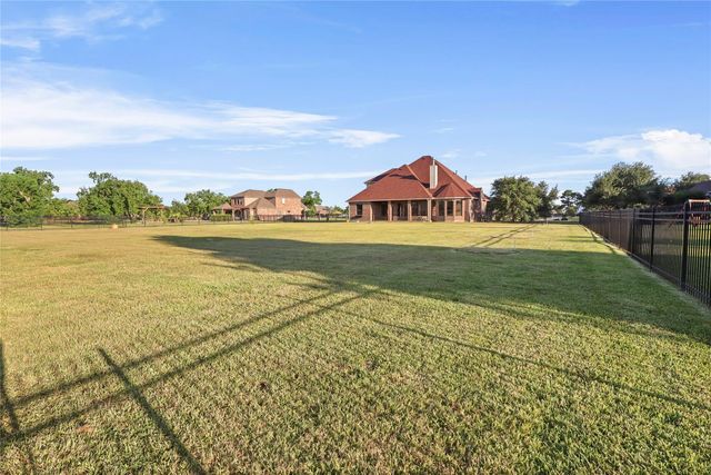 6311 Redfish Reef Drive, Beach City, TX 77523