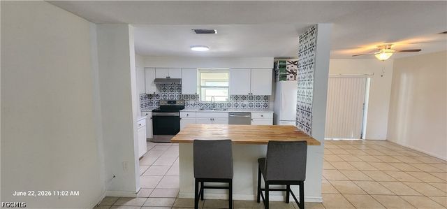1005 E Jasmine RD, Lehigh Acres, FL 33936