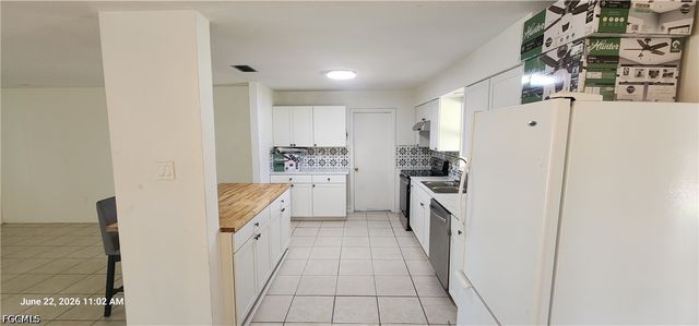 1005 E Jasmine RD, Lehigh Acres, FL 33936