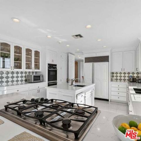 12699 Promontory Road, Los Angeles, CA 90049