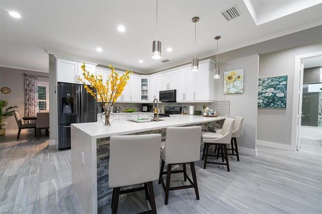 328 16th AVE NW, Naples, FL 34120